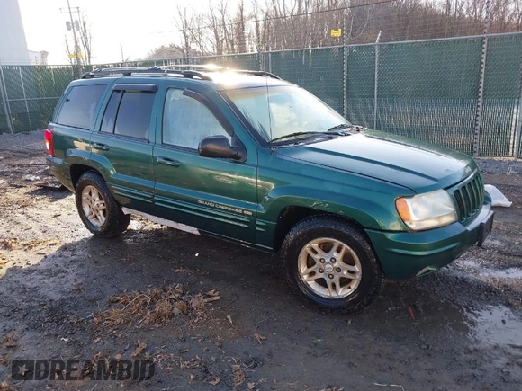 1999 Jeep Grand Cherokee Limited with VIN 1J4GW68S1XC555399, listed as a IAAI auction lot 41764099 with 1 mi miles. Bid and sale history available at carsss.com. Image 1.