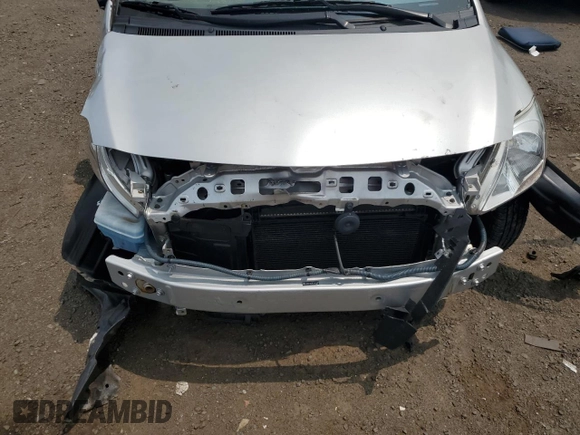 2012 Toyota Yaris z VIN JTDBT4K38C1414236, wystawiony jako Copart lot #58471515 z przebiegiem Nie podano mil oraz Szkoda całkowita • Salvage title. Historia ofert i sprzedaży dostępna na DreamBid. Obrazek 11.