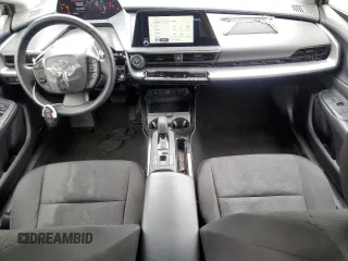 2023 Toyota Prius LE z VIN JTDACAAU5P3007571, wystawiony jako Copart lot #58831845 z przebiegiem 35 706 mil mil oraz Czysty tytuł • Clean title. Historia ofert i sprzedaży dostępna na DreamBid. Obrazek 8.
