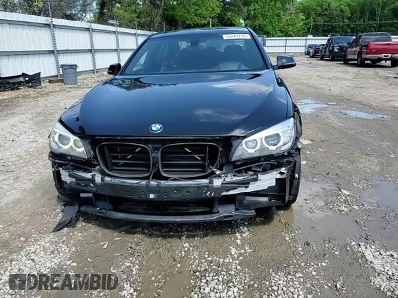 2015 BMW 7 Series 740i z VIN WBAYA6C59FD826788, wystawiony jako Copart lot #55747215 z przebiegiem 134 960 mil mil oraz Szkoda całkowita • Salvage title. Historia ofert i sprzedaży dostępna na DreamBid. Obrazek 14.