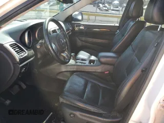 2011 Jeep Grand Cherokee Laredo with VIN 1J4RR4GG3BC671780, listed as a Copart auction lot 49179835 with 166,521 mi miles and Salvage Title. Bid and sale history available at carsss.com. Image 7.