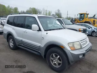 2002 Mitsubishi Montero Limited z VIN JA4MW51R82J060397, wystawiony jako IAAI lot #42133966 z przebiegiem 149 400 mil mil oraz . Historia ofert i sprzedaży dostępna na DreamBid. Obrazek 1.
