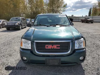2005 GMC Envoy SLT with VIN 1GKDT13S952144349, listed as a Copart auction lot 71800694 with 137,614 mi miles and Salvage Title. Bid and sale history available at DreamBid. Image 5.