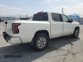 2022 Nissan Frontier SV with VIN 1N6ED1EJ2NN646598, listed as a Copart auction lot 58439325 with 56,882 mi miles and Salvage title. Bid and sale history available at DreamBid. Image 3.