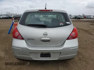 2009 Nissan Versa S with VIN 3N1BC13E79L465505, listed as a Copart auction lot 52097865 with 90,774 mi miles and Salvage Title. Bid and sale history available at DreamBid. Image 6.