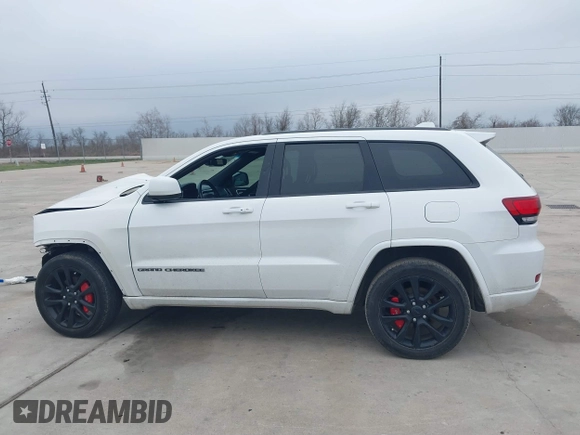 2018 Jeep Grand Cherokee Laredo E with VIN 1C4RJEAG0JC218694, listed as a IAAI auction lot 41587665 with 97,618 mi miles. Bid and sale history available at carsss.com. Image 14.