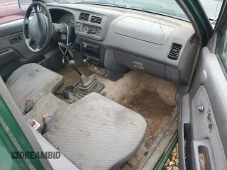 1998 Nissan Frontier XE with VIN 1N6DD21S8WC303274, listed as a Copart auction lot 79755584 with Not provided miles and Salvage title. Bid and sale history available at DreamBid. Image 8.