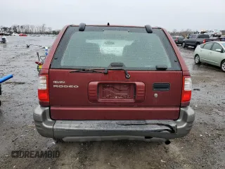 2002 Isuzu Rodeo z VIN 4S2CK58D124323937, wystawiony jako Copart lot #86155194 z przebiegiem 184 491 mil mil oraz Szkoda całkowita • Salvage title. Historia ofert i sprzedaży dostępna na DreamBid. Obrazek 6.