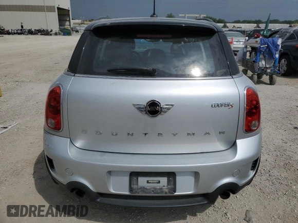 2014 MINI Countryman S with VIN WMWZC5C55EWM18087, listed as a Copart auction lot 68661614 with Not provided miles and Salvage title. Bid and sale history available at DreamBid. Image 6.