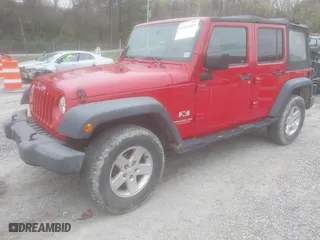 2008 Jeep Wrangler Unlimited X with VIN 1J8GA39128L562347, listed as a IAAI auction lot 41912669 with 106,040 mi miles. Bid and sale history available at carsss.com. Image 2.