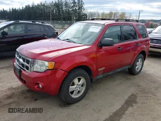 2008 Ford Escape XLT with VIN 1FMCU93168KE53335, listed as a IAAI auction lot 41935885 with 241,723 mi miles. Bid and sale history available at carsss.com. Image 2.