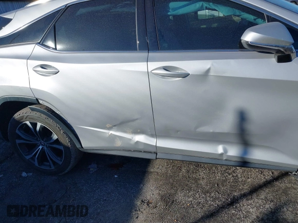 2018 Lexus RX 350 z VIN 2T2ZZMCA6JC096728, wystawiony jako IAAI lot #41356629 z przebiegiem 76 982 mil mil oraz . Historia ofert i sprzedaży dostępna na DreamBid. Obrazek 17.