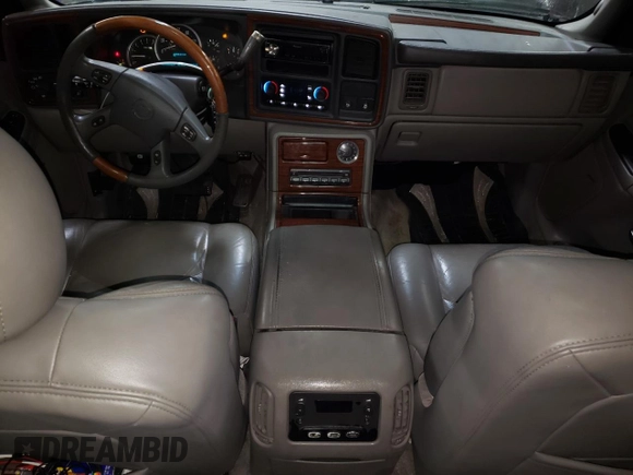 2003 Cadillac Escalade EXT z VIN 3GYEK63N33G118001, wystawiony jako Copart lot #86897574 z przebiegiem 223 953 mil mil oraz Szkoda całkowita • Salvage title. Historia ofert i sprzedaży dostępna na DreamBid. Obrazek 8.