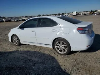 2010 Lexus HS 250h with VIN JTHBB1BA1A2014458, listed as a Copart auction lot 70746254 with 185,474 mi miles and Salvage Title. Bid and sale history available at carsss.com. Image 2.