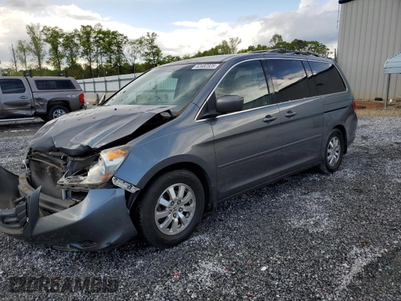 2010 Honda Odyssey EX-L with VIN 5FNRL3H73AB099787, listed as a Copart auction lot 52482325 with 235,785 mi miles and Salvage Title. Bid and sale history available at DreamBid. Image 1.