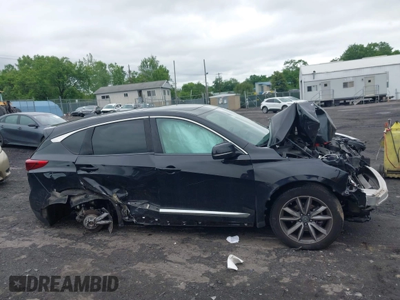 2019 Acura RDX Technology with VIN 5J8TC2H52KL030992, listed as a IAAI auction lot 42459982 with 77,042 mi miles and . Bid and sale history available at DreamBid. Image 13.