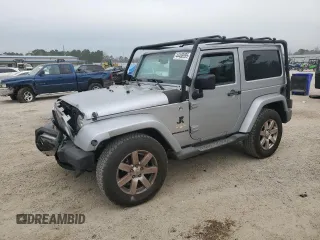 2015 Jeep Wrangler Sahara z VIN 1C4AJWBG8FL651169, wystawiony jako Copart lot #44468995 z przebiegiem 119 419 mil mil oraz Szkoda całkowita • Salvage title. Historia ofert i sprzedaży dostępna na DreamBid. Obrazek 1.