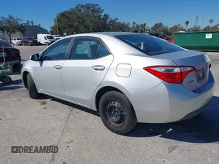 2014 Toyota Corolla L with VIN 2T1BURHE5EC006925, listed as a IAAI auction lot 40917569 with 130,761 mi miles and . Bid and sale history available at DreamBid. Image 3.