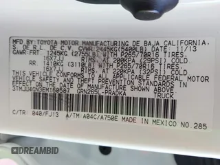 2014 Toyota Tacoma PreRunner with VIN 3TMJU4GN3EM160587, listed as a IAAI auction lot 42710985 with 200,867 mi miles and . Bid and sale history available at DreamBid. Image 9.