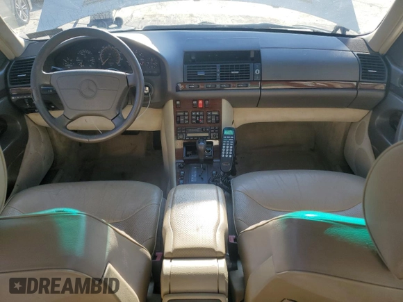 1995 Mercedes-Benz S 320 with VIN WDBGA32E6SA256435, listed as a Copart auction lot 77104234 with 309,498 mi miles and Clean Title. Bid and sale history available at DreamBid. Image 8.