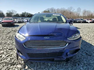 2016 Ford Fusion SE with VIN 3FA6P0H7XGR237571, listed as a Copart auction lot 48798975 with 128,410 mi miles and Salvage Title. Bid and sale history available at DreamBid. Image 5.