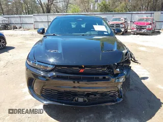 2024 Dodge Hornet GT z VIN ZACNDFAN6R3A40380, wystawiony jako IAAI lot #41772565 z przebiegiem 4 828 mil mil oraz . Historia ofert i sprzedaży dostępna na DreamBid. Obrazek 13.