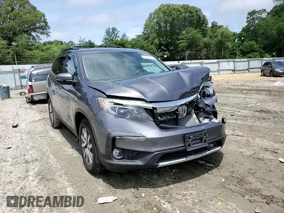 2019 Honda Pilot EX-L with VIN 5FNYF6H52KB043098, listed as a Copart auction lot 59011445 with 88,398 mi miles and Salvage title. Bid and sale history available at DreamBid. Image 14.