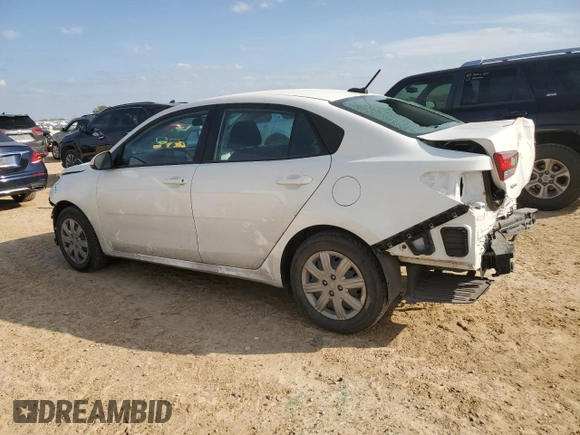 2023 Kia Rio S with VIN 3KPA24AD1PE615715, listed as a Copart auction lot 45717065 with 24,486 mi miles and Salvage Title. Bid and sale history available at carsss.com. Image 2.
