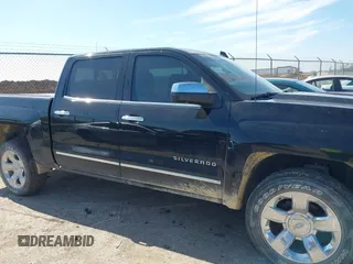 2016 Chevrolet Silverado 1500 LTZ with VIN 3GCUKSEC4GG318090, listed as a IAAI auction lot 41572873 with 82,008 mi miles and . Bid and sale history available at DreamBid. Image 13.