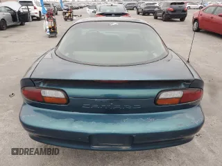 2000 Chevrolet Camaro Z28 z VIN 2G1FP22G3Y2113181, wystawiony jako Copart lot #53142765 z przebiegiem 191 379 mil mil oraz Czysty tytuł • Clean title. Historia ofert i sprzedaży dostępna na DreamBid. Obrazek 6.