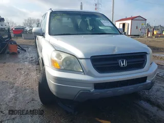 2003 Honda Pilot EX with VIN 2HKYF18633H580612, listed as a IAAI auction lot 41670305 with 216,798 mi miles and . Bid and sale history available at carsss.com. Image 1.