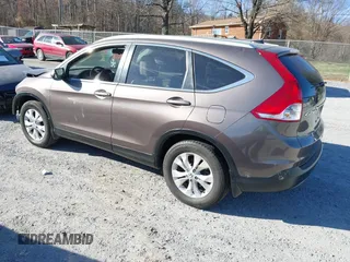 2014 Honda CR-V EX-L with VIN 2HKRM4H79EH684688, listed as a IAAI auction lot 41785089 with 106,951 mi miles. Bid and sale history available at carsss.com. Image 3.