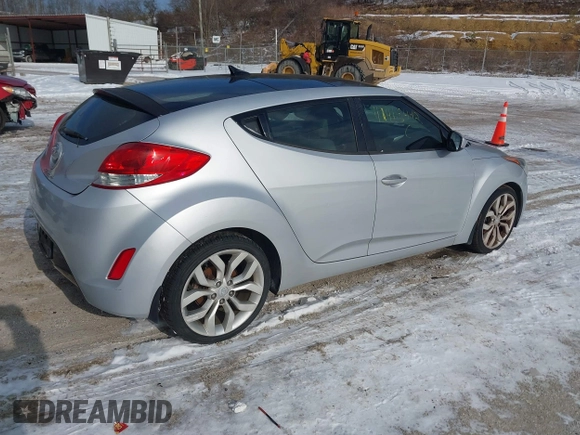 2012 Hyundai Veloster w/Gray Int with VIN KMHTC6AD3CU029042, listed as a IAAI auction lot 41416442 with 109,968 mi miles and . Bid and sale history available at DreamBid. Image 4.