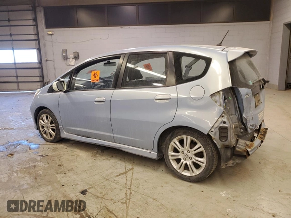 2010 Honda Fit Sport with VIN JHMGE8H42AC023154, listed as a Copart auction lot 42262615 with 104,928 mi miles and Salvage Title. Bid and sale history available at carsss.com. Image 2.