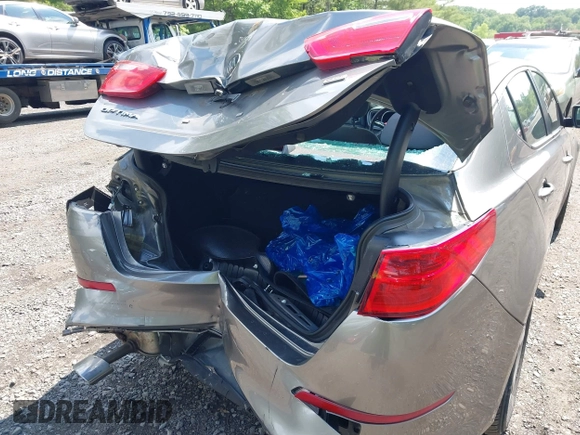 2015 Kia Optima LX z VIN 5XXGM4A73FG375345, wystawiony jako IAAI lot #42373557 z przebiegiem 180 029 mil mil oraz . Historia ofert i sprzedaży dostępna na DreamBid. Obrazek 6.