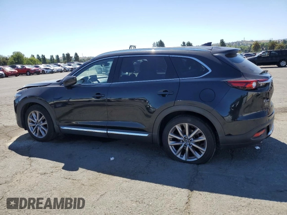 2020 Mazda CX-9 Grand Touring z VIN JM3TCADYXL0414926, wystawiony jako Copart lot #57528945 z przebiegiem 93 768 mil mil oraz Szkoda całkowita • Salvage title. Historia ofert i sprzedaży dostępna na DreamBid. Obrazek 2.