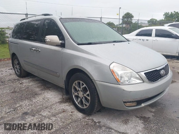 2014 Kia Sedona EX with VIN KNDMH4C74E6578326, listed as a IAAI auction lot 41990311 with 220,772 mi miles. Bid and sale history available at carsss.com. Image 1.