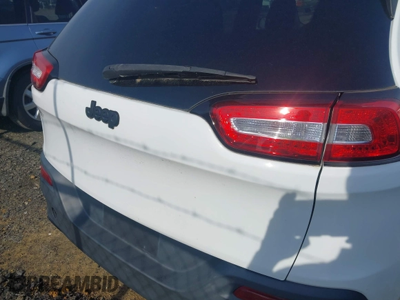 2016 Jeep Cherokee Altitude with VIN 1C4PJLABXGW323881, listed as a IAAI auction lot 42289189 with 147,631 mi miles and . Bid and sale history available at DreamBid. Image 18.
