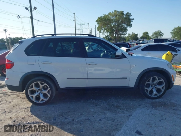 2011 BMW X5 35i with VIN 5UXZV4C52BL410497, listed as a IAAI auction lot 41995459 with 162,781 mi miles. Bid and sale history available at carsss.com. Image 13.