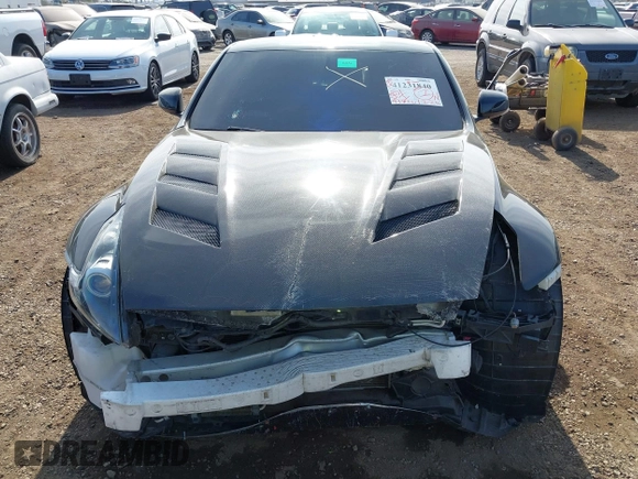 2009 Nissan 370Z Touring with VIN JN1AZ44E39M408668, listed as a IAAI auction lot 41231840 with 93,826 mi miles and . Bid and sale history available at DreamBid. Image 13.