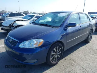 2005 Toyota Corolla CE with VIN 1NXBR32E85Z461242, listed as a IAAI auction lot 42224432 with 263,490 mi miles and . Bid and sale history available at DreamBid. Image 2.