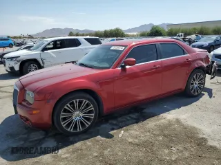 2010 Chrysler 300 with VIN 2C3CA2CV4AH330352, listed as a Copart auction lot 70720414 with 164,673 mi miles and Salvage Title. Bid and sale history available at carsss.com. Image 1.