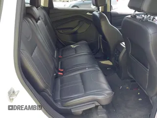 2013 Ford Escape Titanium z VIN 1FMCU9J9XDUA10838, wystawiony jako IAAI lot #42702521 z przebiegiem 86 815 mil mil oraz . Historia ofert i sprzedaży dostępna na DreamBid. Obrazek 8.
