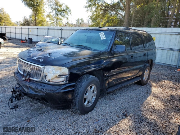 2002 GMC Yukon Denali with VIN 1GKEK63U12J127889, listed as a Copart auction lot 82351563 with 0 mi miles and Non Repairable. Bid and sale history available at carsss.com. Image 1.