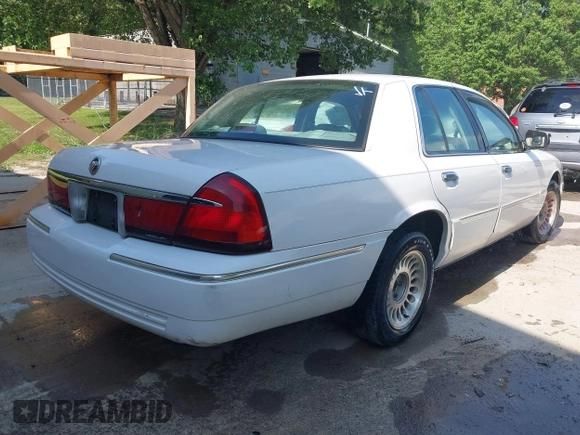 2002 Mercury Grand Marquis LS Premium with VIN 2MEFM75W82X642134, listed as a IAAI auction lot 42134033 with 252,295 mi miles and . Bid and sale history available at DreamBid. Image 4.