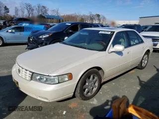 2003 Cadillac Seville Touring STS z VIN 1G6KY54953U193396, wystawiony jako Copart lot #85299294 z przebiegiem 108 429 mil mil oraz Szkoda całkowita • Salvage title. Historia ofert i sprzedaży dostępna na DreamBid. Obrazek 1.