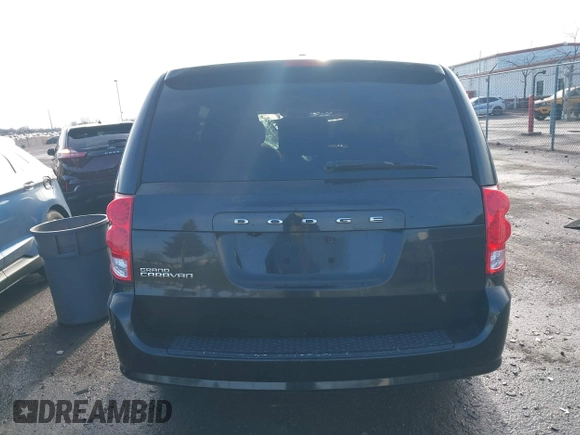 2019 Dodge Grand Caravan SE with VIN 2C4RDGBGXKR528085, listed as a IAAI auction lot 41946407 with 166,854 mi miles and . Bid and sale history available at DreamBid. Image 16.