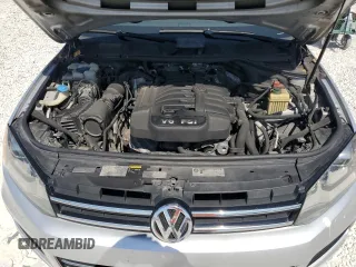 2014 Volkswagen Touareg Sport with VIN WVGEF9BP8ED005445, listed as a Copart auction lot 53694215 with 194,711 mi miles and Salvage Title. Bid and sale history available at DreamBid. Image 12.