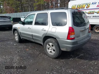 2001 Mazda Tribute LX with VIN 4F2YU08151KM06561, listed as a IAAI auction lot 41478779 with 54,826 mi miles and . Bid and sale history available at DreamBid. Image 3.