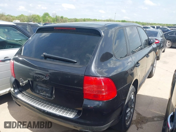 2005 Porsche Cayenne S with VIN WP1AB29P45LA65268, listed as a IAAI auction lot 41723233 with 303,526 mi miles. Bid and sale history available at carsss.com. Image 4.